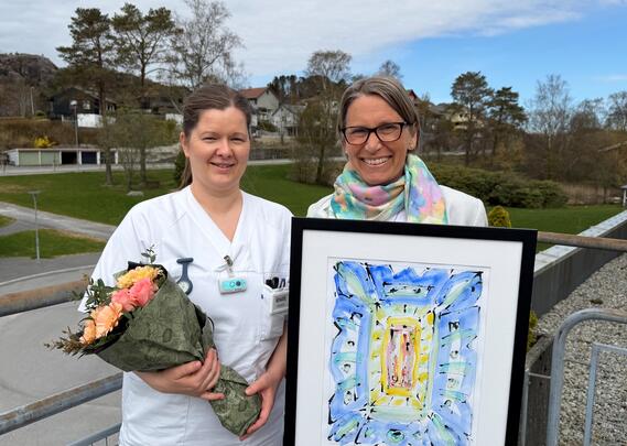 Prisvinneren sammen med fylkesleder